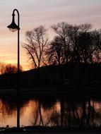 Lantern by the River at sunset