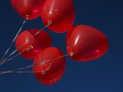 red hearts balloons sky love