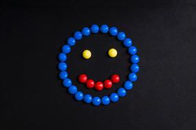 candy colored smiley face