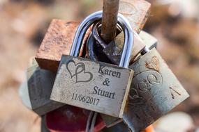 a bunch of locks on the fence love