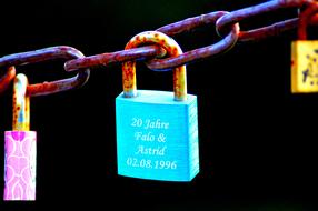 iron locks on a rusty chain