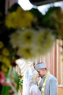 a couple in love under flowers