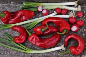 green onions, red peppers and radishes