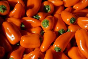 lot of orange bell pepper close-up