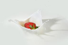 Strawberry Falling Into Milk