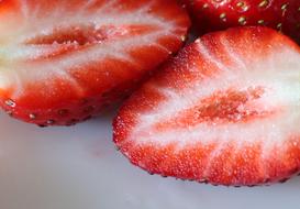 Red Sweet Strawberry cut in halves, macro