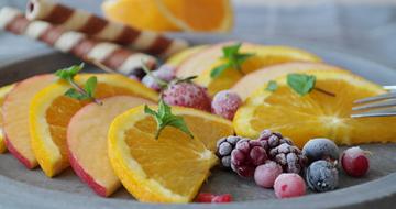 chopped apples and oranges as dessert