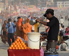 dealer of fresh orange juice on the street