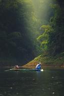 fishing on a lake in asia