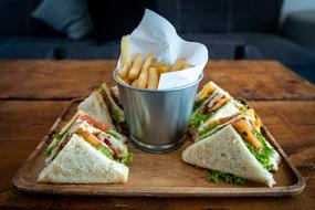 Sandwiches and french fries on tray