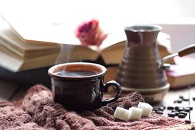 aromatic coffee in a brown cup