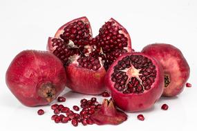 Pomegranate Fruit Seeds on a white background