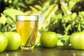 green Apples and beverage in glass