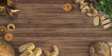 variety of baked goods on a wooden surface