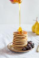 appetizing Pancakes with the honey on breakfast