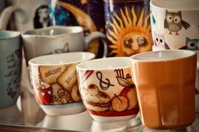 assortment of multi-colored cups in a bar