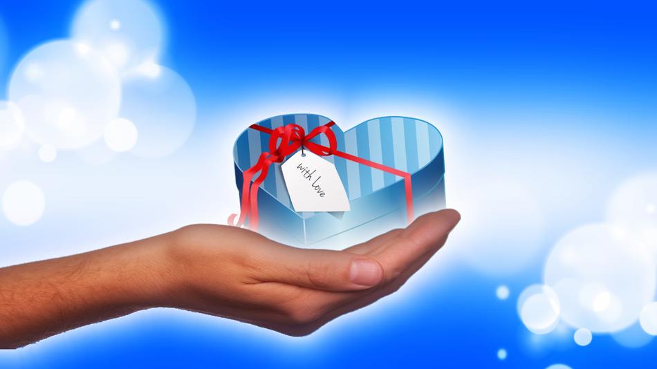 heart box in hand background