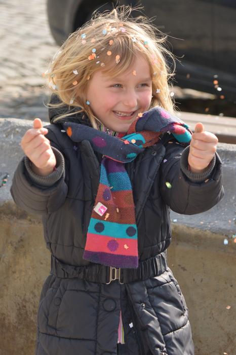 Child playing with Confetti