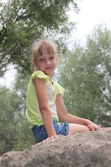 The Little Girl at Summer sunlight