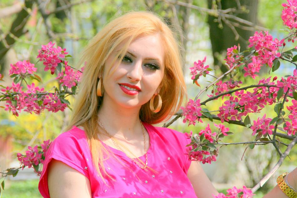 portrait of girl and pink flowers