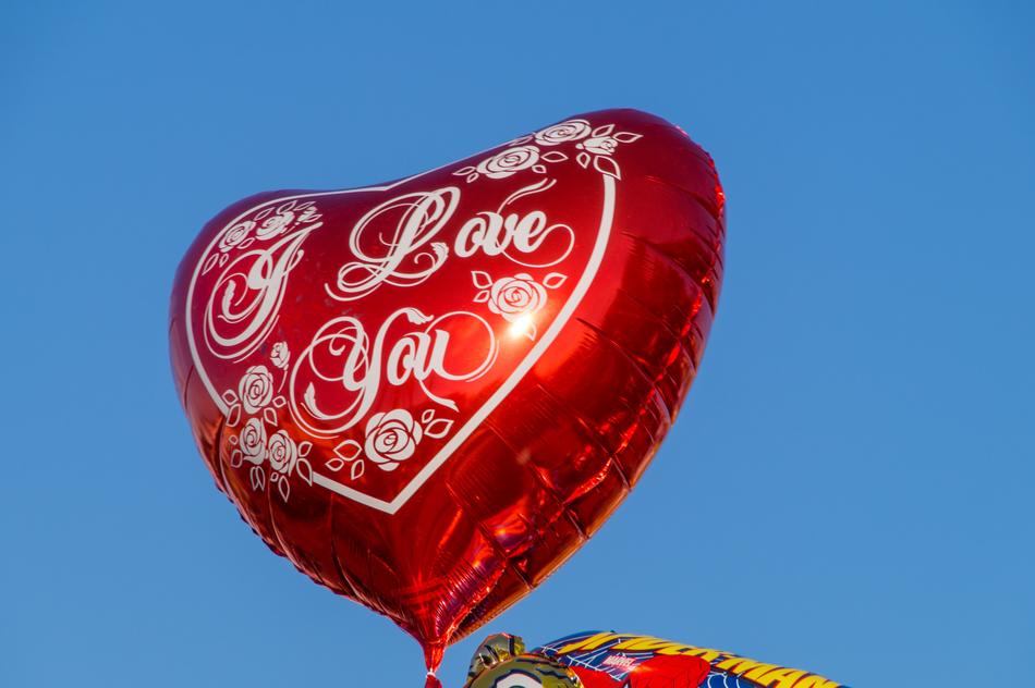 heart shaped balloon with an inscription