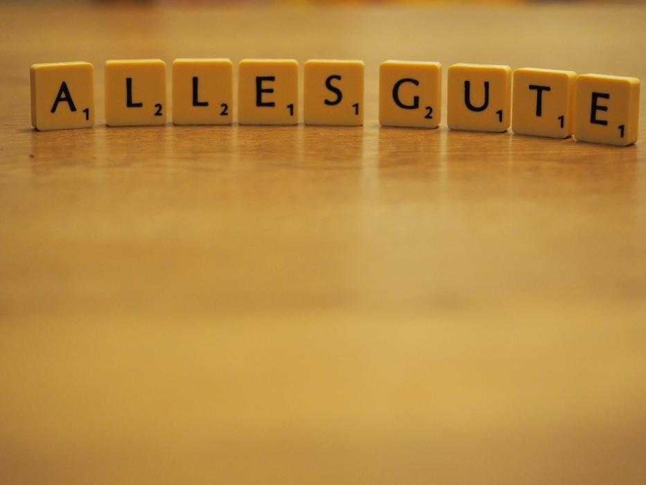 wooden cubes lined up in the word