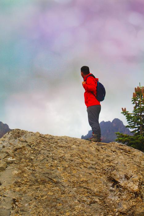 Man in a red jacket on the mountain