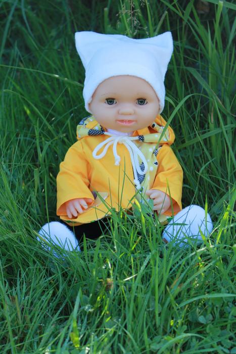 Bobblehead Toy on Grass