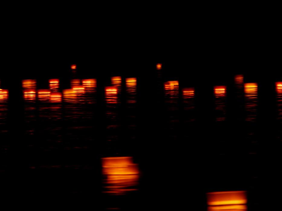 Reflection of lanterns in black water