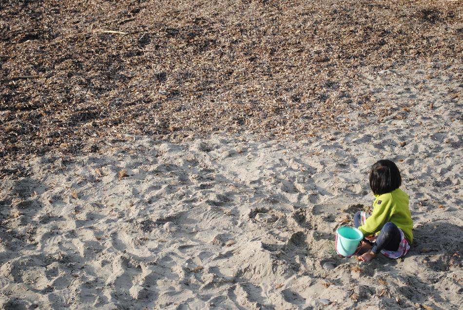 Child Playing In Sand Little Girl
