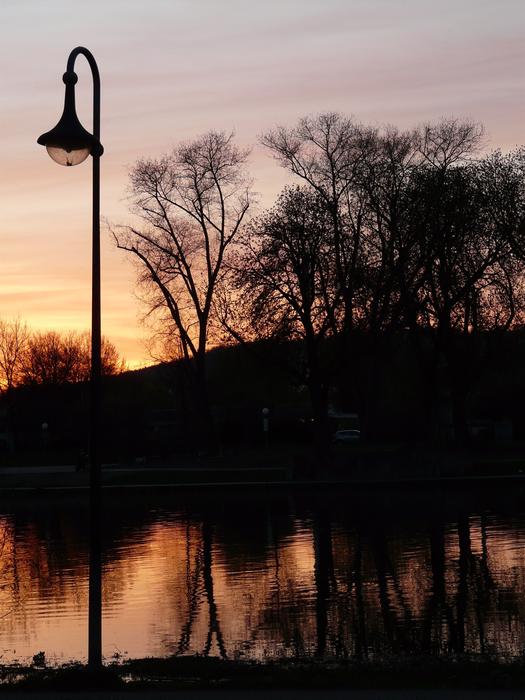 Lantern by the River at sunset
