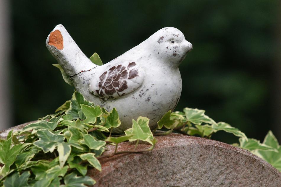 white sparrow sculpture