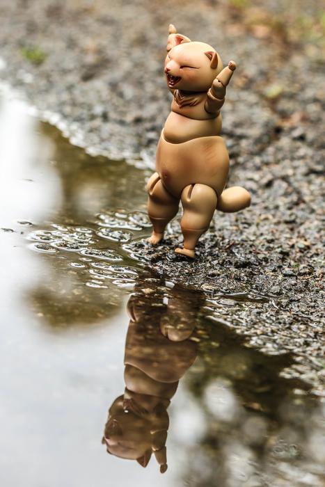 dinosaur toy beach water