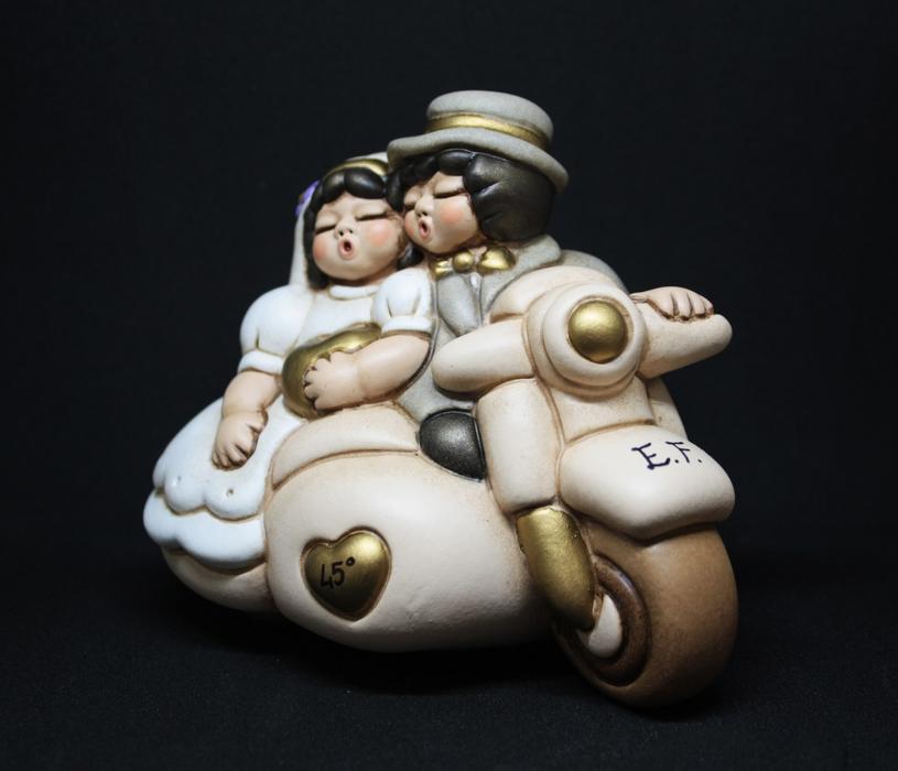 figure motorcycle man woman