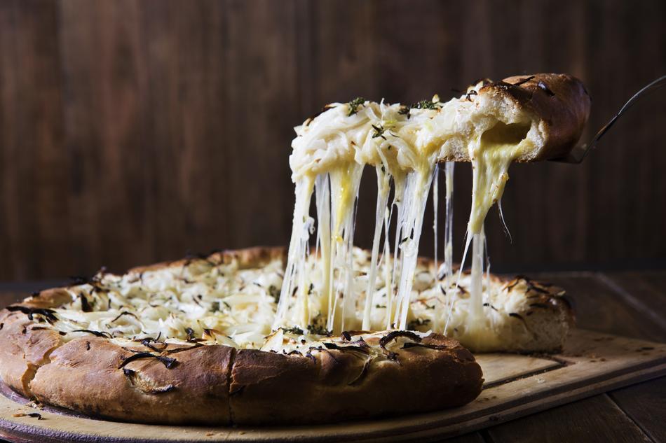 pizza with melted mozzarella cheese