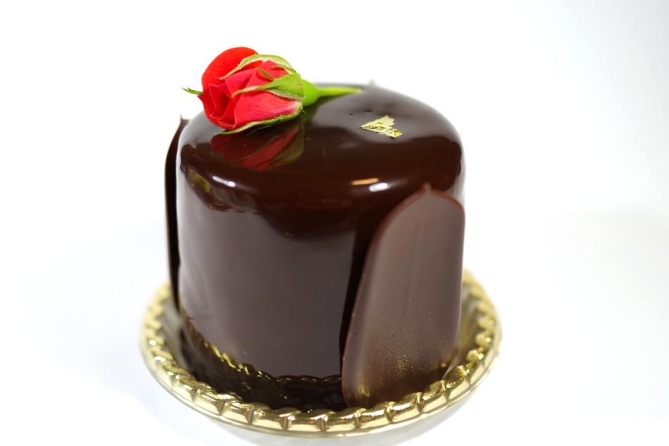 Chocolate dessert with tiny rose