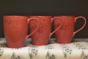 red coffee mugs