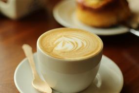 cappuccino in a cafe close-up on a blurred background