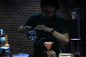 man Brewing Coffee