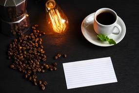 espresso in a white cup with mint leaves