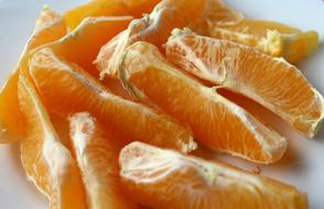 peeled pieces of Orange