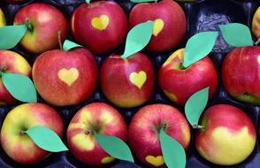 red Apples with yellow Hearts on sides