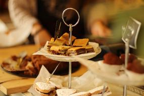 Cakes on stands in Coffee Shop