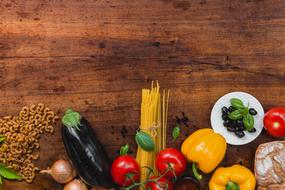 multi-colored vegetables and pasta on the table