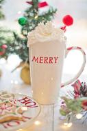 Hot Chocolate with Whipped Cream in mug on table, christmas dessert