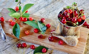 Sour Cherries Fruits on wood