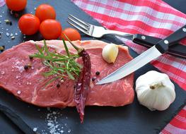 Rumpsteak with vegetables on a cutting board
