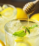 Close up photo of honey and Citrus soda beverage