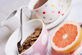 Breakfast, grain flakes and citrus fruit