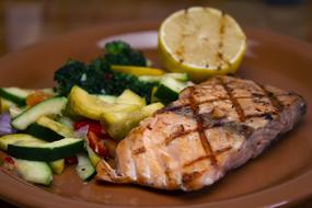 grilled salmon with salad as a dish